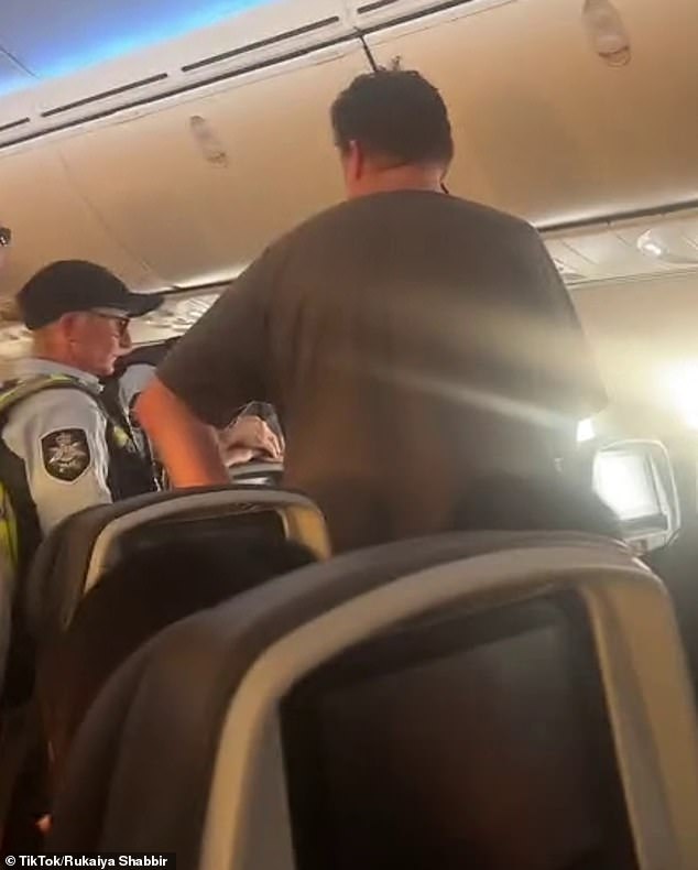 Police removed the man from the plane after it made an emergency landing in Darwin