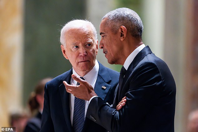 US President Joe Biden (L) speaks with former President Barack Obama (R) prior to a memorial service for Ethel Kennedy