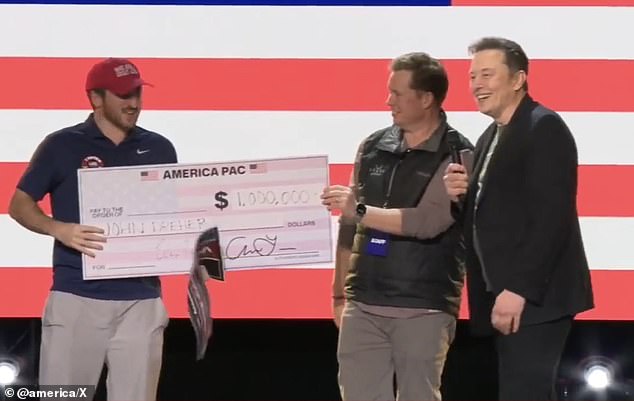 Elon Musk (pictured right, on stage in Philadelphia) pledged to give away $1 million every day until November 5 to registered voters in key swing states who signed his online petition for free speech and gun rights