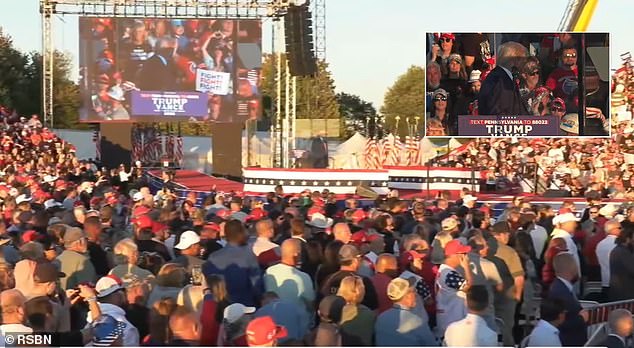 At one point, the former president had to interrupt the meeting after a woman fainted. They shouted 'we love Trump!' and sang the national anthem for about four minutes while she was attended.