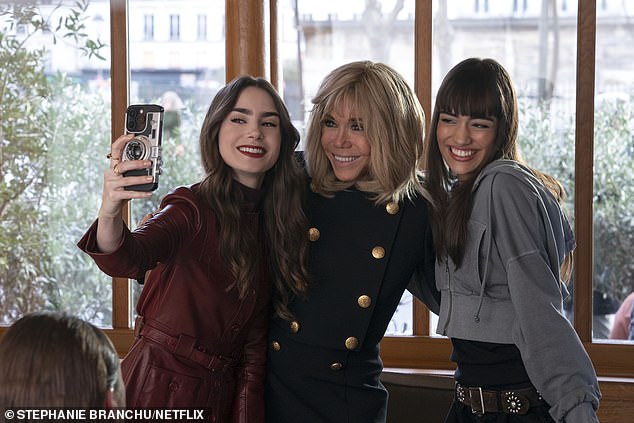 Lily Collins as Emily poses with Brigitte Macron and Thalia Besson as Genevieve in the hit Netflix show