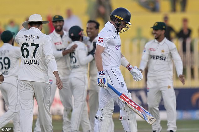 Ollie Pope walks off after being dismissed as England fought Pakistan