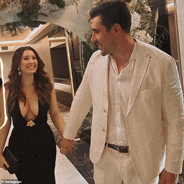 FBoy Island's Nick Brown and Molly O'Halloran revealed they are planning to take the next big step in their relationship as they shared a photo of themselves at a wedding (pictured)