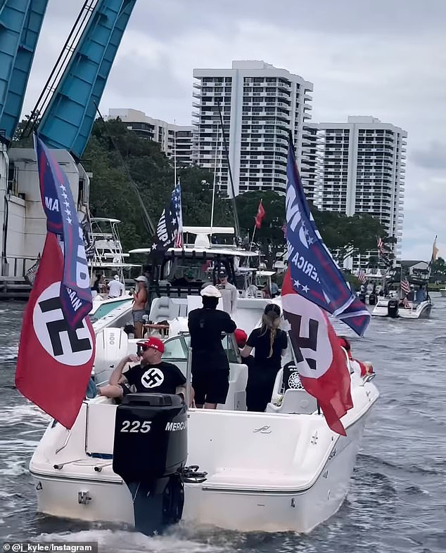 A group of neo-Nazis were driven around Trump's boat parade this weekend wearing Swastika flags and shirts