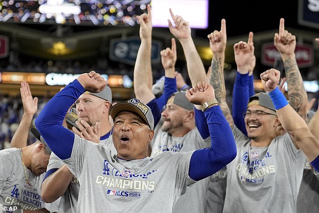 Dodgers manager Dave Roberts celebrates after their win against the Mets in Game 6