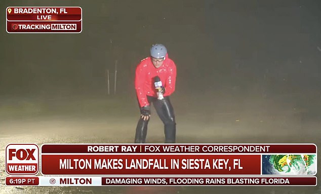 Robert Ray, a correspondent for Fox Weather, was seen on camera, complete with bicycle helmet and goggles, barely able to stand upright