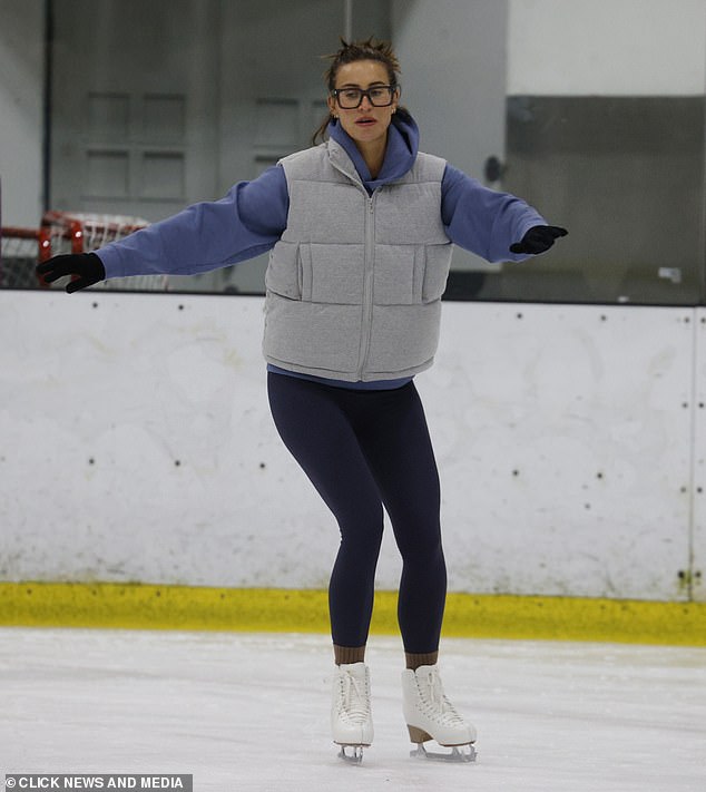 Staying warm in black leggings and matching gloves, the reality favorite was snapped mastering her moves before appearing on the hit ITV show, which starts in January.