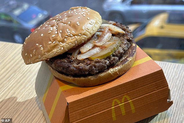 As a deadly E coli outbreak has been linked to McDonald's Quarter Pounders (pictured here), food safety experts revealed the red flags of their fast food restaurants