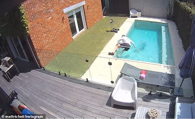 Pictured: The moment Richardson fell into his backyard pool when he lost his balance while cleaning it this week