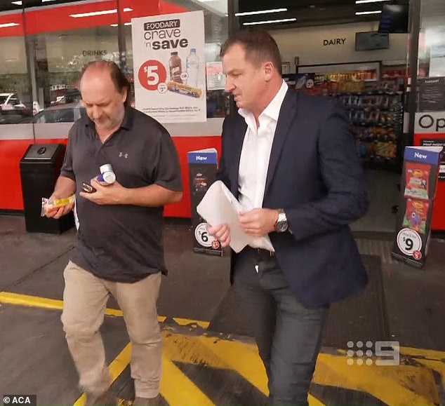 Channel Nine reporter Neil Breen (right) suffered a very unfortunate wardrobe blunder on Thursday evening