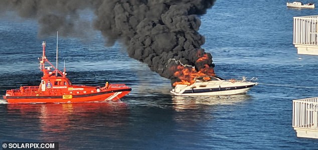 The fire broke out in the engine room and quickly spread to the rest of the ship in Mahon, the capital of the Mediterranean island, on Sunday.