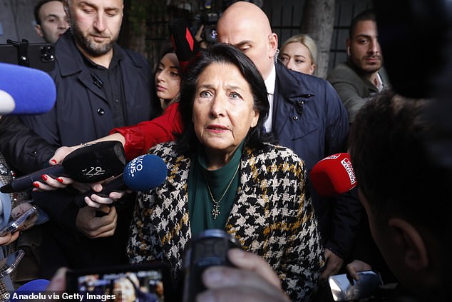 President Salome Zourabichvili (pictured) stood side by side with the Georgian opposition, saying they did not recognize the outcome and calling on protesters to take to the streets.