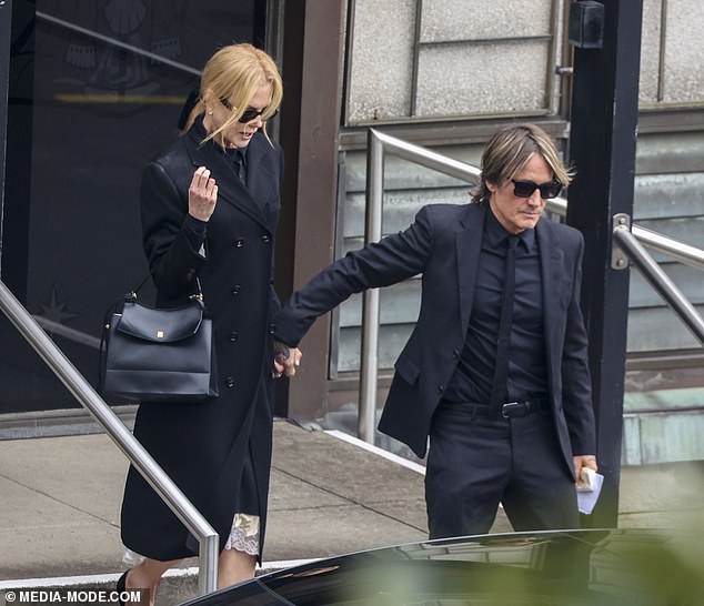 Nicole Kidman was supported by her loving husband Keith Urban on Tuesday as they attended her mother Janelle's funeral in Sydney