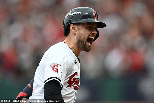 Cleveland Guardians outfielder Lane Thomas (8) runs the bases after hitting a grand slam in the fifth inning against the Detroit Tigers