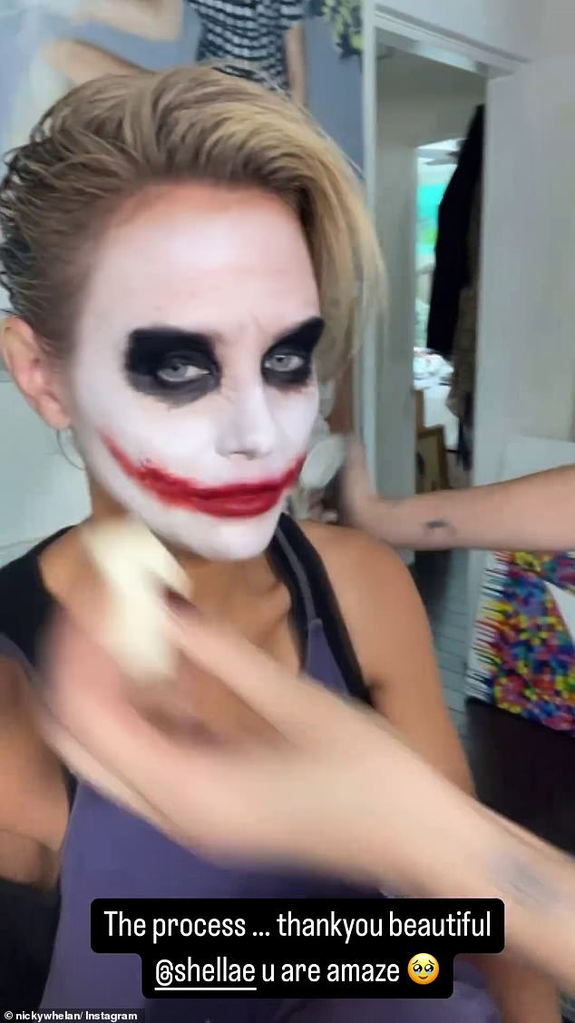 Nicky put on a creative show with white face makeup, bright red lips and dark eyes