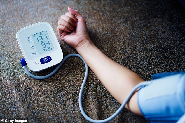 Blood pressure is measured in millimeters of mercury (mm Hg). A healthy blood pressure for most adults is 90 to 120/60 to 80 mm Hg (stock image)