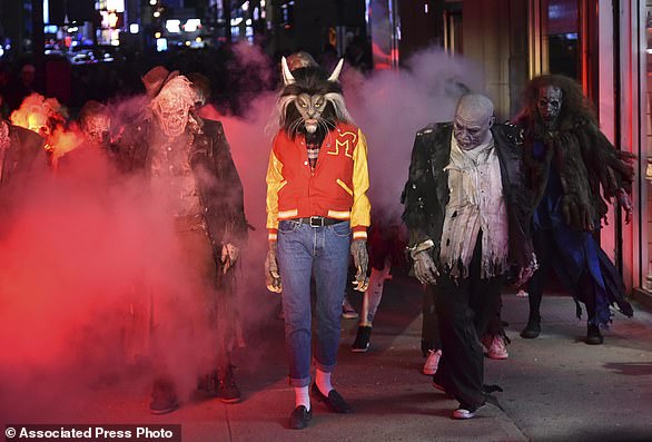 FILE - Heidi Klum, dressed as a werewolf, performs a Michael Jackson dance "Thriller" video her 18th annual Halloween party at Moxy Times Square on Tuesday, October 31, 2017 in New York. (Photo by Evan Agostini/Invision/AP, file)