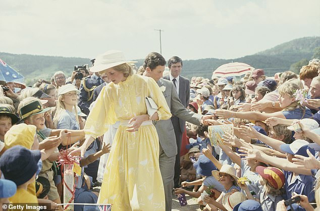 The Prince and Princess of Wales greet the crowd during a visit to the Ginger Factory in Yandina, Queensland, in April 1983