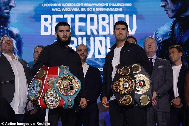 Russian fighters Dmitry Bivol (right) and Artur Beterbiev (left) fight to become the undisputed light-heavyweight champion