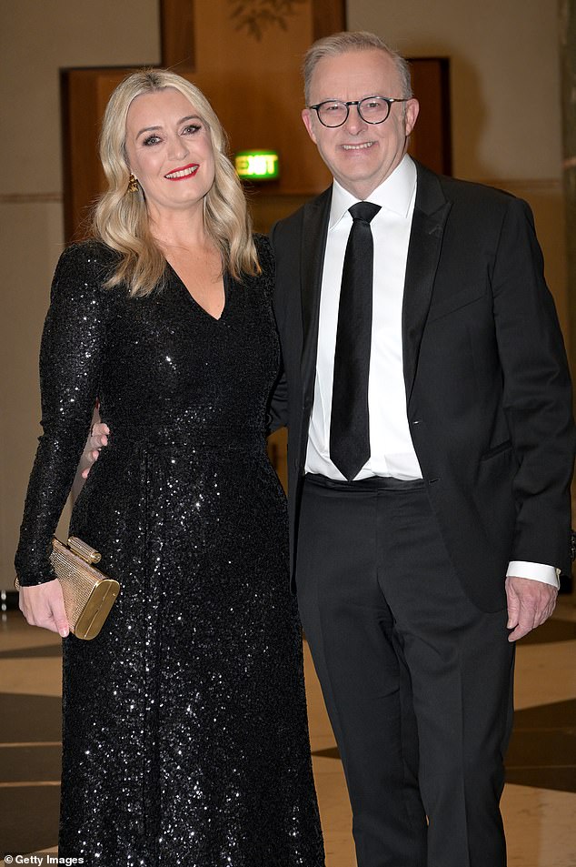 Prime Minister Anthony Albanese (pictured right with partner Jodie Haydon) stands to make a tidy $500,000 profit from the sale of an investment property in Sydney