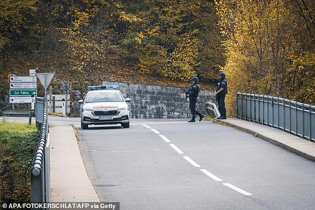 Police officers patrol Rohrbach, Upper Austria, on October 28, 2024, after at least two men were shot dead in the morning in the Mühlviertel region