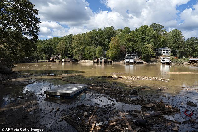 Experts have predicted that a tropical depression could form in the Gulf of Mexico, bringing unorganized rain and thunderstorms in the coming days. Pictured: Pieces of a destroyed dock are seen in Lake Lure, North Carolina on October 2