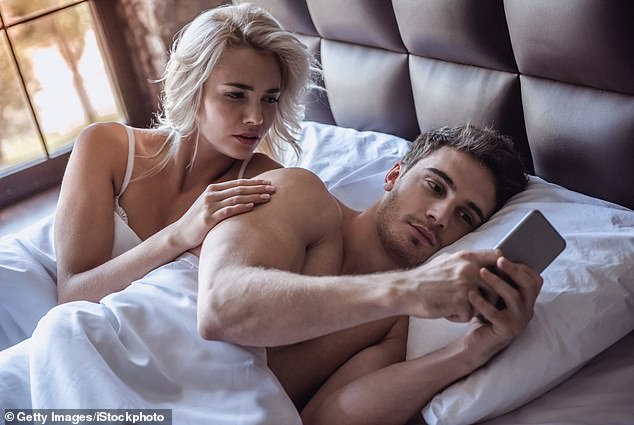 A relationship researcher has revealed the different ways people can get away with cheating (stock image)