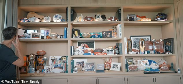 Tom Brady showed off his outrageous trophy case in a new video on YouTube