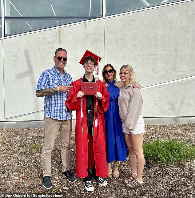 Dan Osborn (L) poses with his son Liam (CL), wife Megan (CR) and daughter Eve (R)