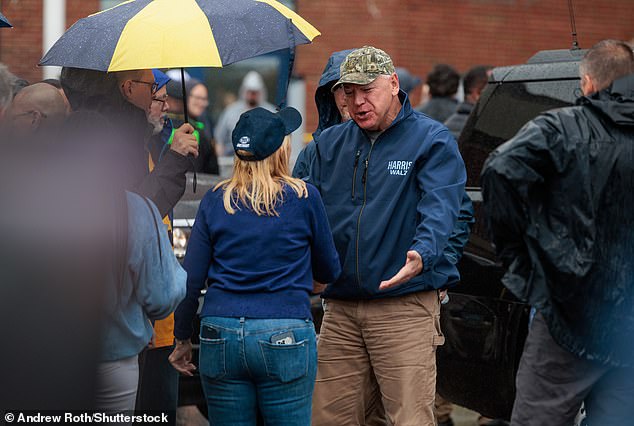 Tim Walz took breaks from debate prep to watch football while attending the football game between the University of Michigan and the University of Minnesota