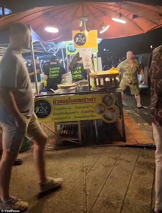 The Brit was visiting the food stalls of Chang Phuak in Chiang Mai, Thailand, with friends when he reportedly decided to light up a cigarette