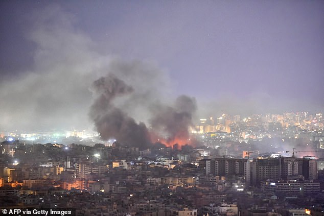 Smoke rises from the scene of an Israeli airstrike on a neighborhood in a southern suburb of Beirut, on October 3