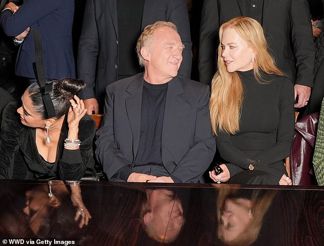 Nicole Kidman's tense interaction with Salma Hayek at Paris Fashion Week could damage her brand ambassador deal with Balenciaga. Salma's husband François-Henri Pinault is CEO of the brand's parent company. Salma, Francois and Nicole were pictured on the show last month