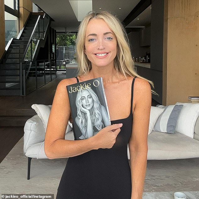 On Wednesday's The Kyle and Jackie O Show, the radio queen, 49, was called out for a shocking embellishment on the book's cover by co-star Brooklyn Ross