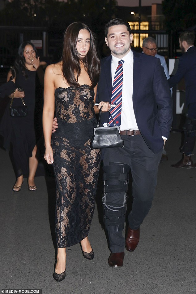 Brandon Smith arrived with partner Isabella Williams, who went for a sheer black lace dress that showed off her underwear. All eyes were on Isabella in the low-cut piece, which she paired with a pair of black pumps. Both shown