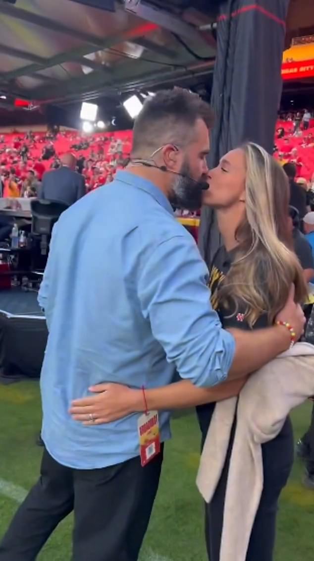 Jason and Kylie Kelce shared a kiss on the field at Arrowhead Stadium on Monday night