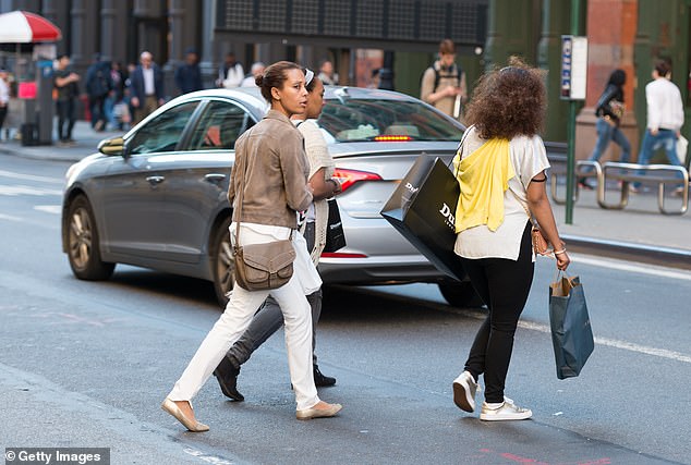 Pedestrians jaywalking (stock image)