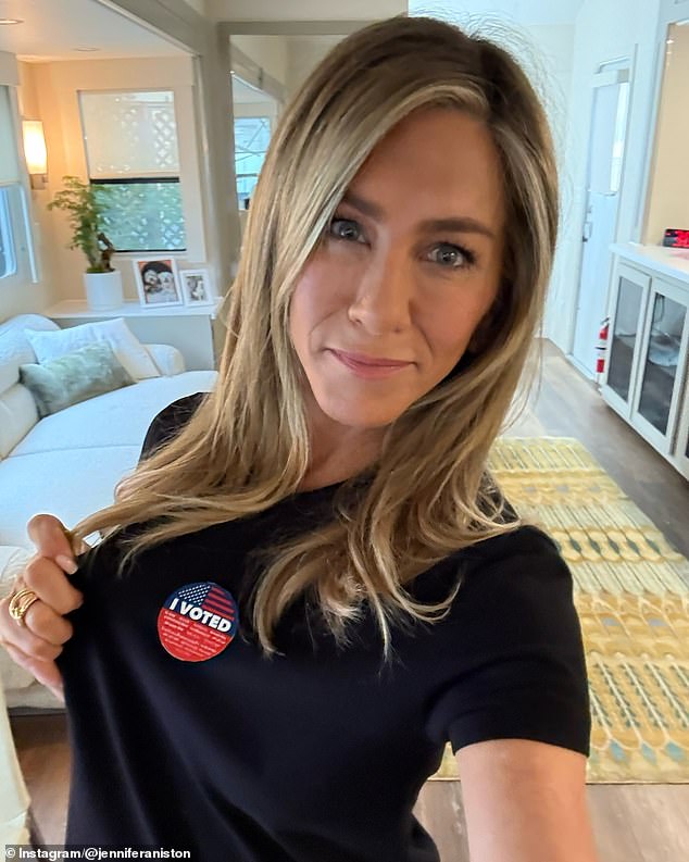 Jennifer Aniston has shared an interesting detail about her dressing room as she urges fans to vote. Aniston, who appeared to be in her dressing room, had photos framed on a table next to a couch