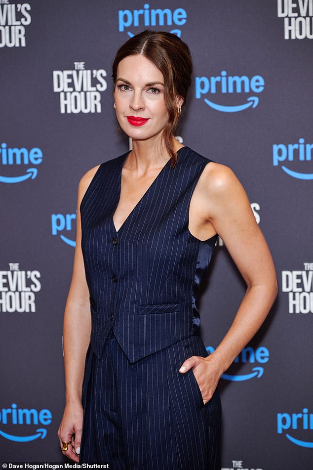 Jessica Raine, 42, was the epitome of chic in a blue pinstripe ensemble as she attended a photocall for her Prime Video series The Devil's Hour on Wednesday