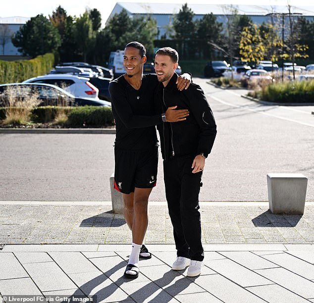 Jordan Henderson received a hero's welcome during his visit to the AXA Training Center on Friday