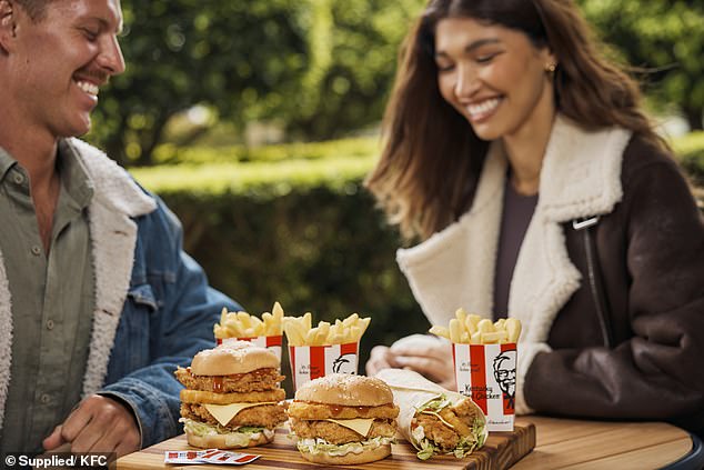 KFC Australia has brought back its iconic Tower Burger (middle) - and added an even bigger one to the range (left) and a wrap (right)