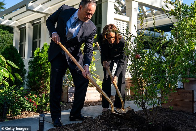 Vice President Kamala Harris and Doug Emhoff plant a pomegranate tree at the Vice President's residence at the US Naval Observatory on October 7