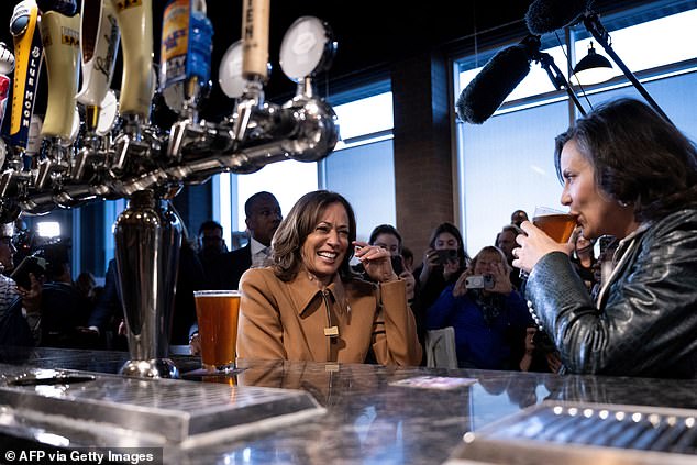 Vice President Kamala Harris and Michigan Governor Gretchen Whitmer stop at Trak Houz Bar and Grill on October 26, 2024 in Kalamazoo, Michigan. At the event, Harris told Whitmer which demographic her campaign is targeting, just days until the election