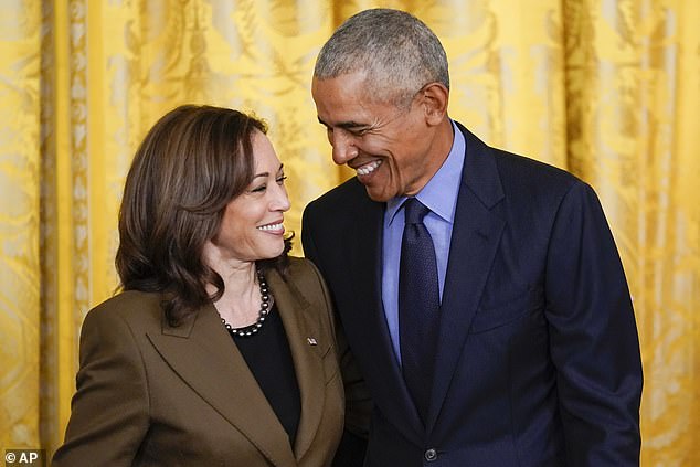 Former President Barack Obama talks with Vice President Kamala Harris at the White House