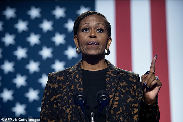 US First Lady Michelle Obama speaks during a meeting with US Vice President and Democratic presidential candidate Kamala Harris at the Wings Event Center in Kalamazoo, Michigan