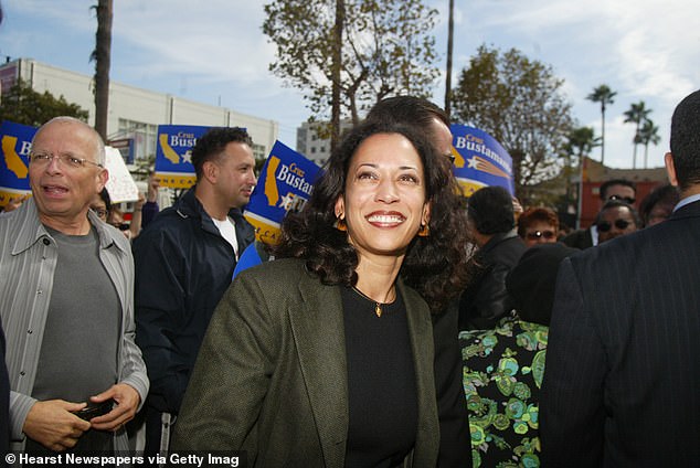 Kamala Harris meets with supporters during her campaign as she runs for district attorney