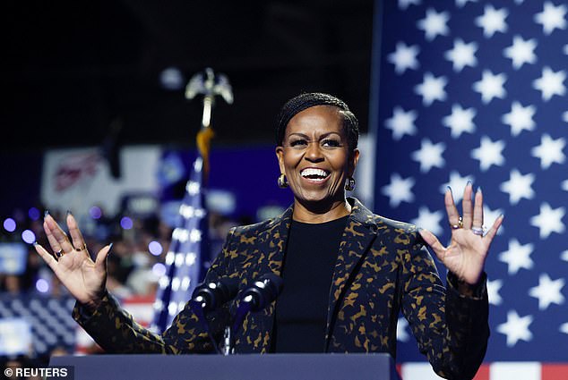 Former First Lady Michelle Obama speaks at Kamala Harris' rally in Kalamazoo, MI on Saturday. It was her first appearance on the campaign trail in 2024