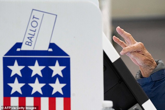 A voter casting a ballot in North Carolina on October 18. More than eight million people have already cast ballots for the 2024 election, either absentee or via early in-person voting