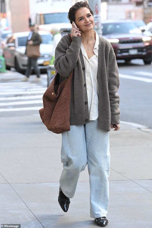 Katie Holmes enjoyed a cheerful phone call in New York City on Thursday, hours before her opening night in a star-studded revival of Our Town