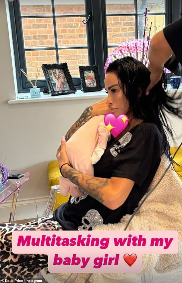 Katie Price posted a new photo with 'my baby girl' on Instagram on Monday after causing confusion with a wink while cuddling a newborn baby boy after 'welcoming twins'